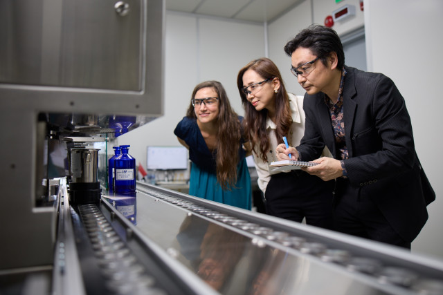 Photo credit: IFF - Colleagues at IFF Chin Bee with the site’s new smart-dosing robot.