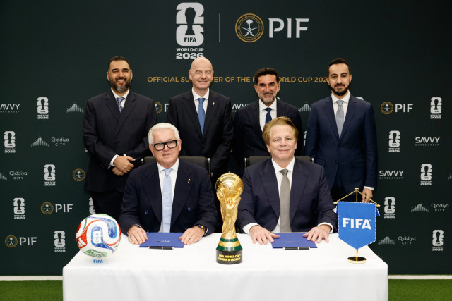14 May, 2026: Front row (L-R), Romy Gai, Chief Business Officer, FIFA and Kevin Foster, Managing Director and Head of Corporate Affairs, PIF, back row (L-R), H.R.H Prince Faisal Bin Bandar Bin Sultan Al Saud, Vice Chairman, Savvy Games Group, Gianni Infantino, President, FIFA, H.E. Yasir Othman Al-Rumayyan, Governor, PIF and Muhannad AlDawood, Chief Strategy Officer, Qiddiya Investment Company witnessed the signing of the partnership of PIF as Official Tournament Supporter of FIFA World Cup 2026™, incorporating PIF companies, Savvy Games Group and Qiddiya City (Photo by PIF)