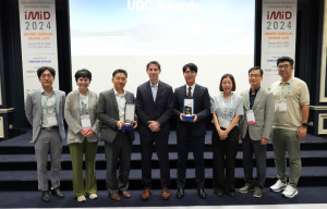 UDC Team with Award Recipients at IMID 2024