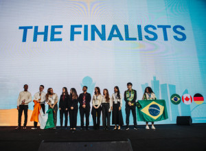 Finalists of the 2024 iTwin4Good Challenge on the competition stage in Kazakhstan. (Image courtesy of Bentley Systems and Enactus)
