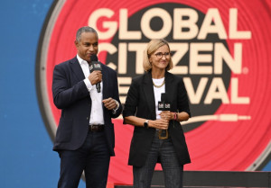 NEW YORK, NEW YORK - SEPTEMBER 27: (L-R) Michael Roberts and Nuria Garcia speak onstage during the 2025 Global Citizen Festival at Central Park on September 27, 2025 in New York City. (Photo by Noam Galai/Getty Images for Global Citizen)
