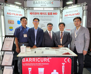 Group photo of representatives from MEDIPEAU Inc. and GNPharm at the conference venue