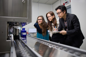 Photo credit: IFF - Colleagues at IFF Chin Bee with the site’s new smart-dosing robot.