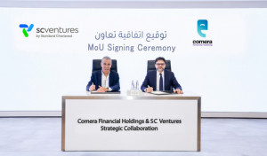 Akhtar Saeed Hashmi, Managing Director & Group CEO of Comera Financial Holdings, and Alex Manson, CEO of Standard Chartered Ventures, sign an MoU anno...
