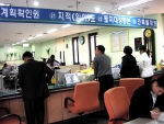 전산 출력된 지적도 및 발급 장면