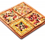 한국피자헛(www.pizzahut.co.kr 대표 조인수)이 국내 피자업계 최초로 네 가지의 피자 메뉴를 한 판에 모아 선보이는 신메뉴를 출시했다.