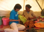 Photo Caption: Shui-Meng, Representative, UNICEF, Timor-Leste
with Lidia Octavia (mother of two day