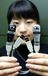 선양디엔티는 휴대용 저장장치인 USB 메모리에 VoIP 카메라(웹 카메라) 기능을 부가시킨 컨버전스 제품 볼복스(Volvox)를 출시했다.