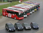 Kia VIK with Kia team buses