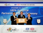 (left to right) Steve S. Yang, President and CEO of Hyundai Motor Company, Michel Platini, President