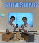 10월 29일 서울 코엑스(COEX)에서 개막한 2013 대한민국 친환경 대전 
ECO-EXPO KOREA 2013에 참가한 삼성전자가 친환경 컨셉 프린터, 100% 재생 용지를 