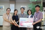 15일 인천 갈산 중학교가 실천하는 NGO 함께하는 사랑밭을 통해 저소득 가정을 위한 후원금을 전달했다