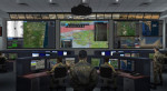 Representation of a NATO command and control center with NCOP vision on the screen © Thales