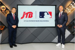 Eijiro Yamakita, JTB President & CEO (left) at MLB headquarters in New York City with Noah Garden, D