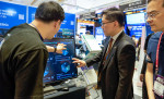 류광준 과학기술정보통신부 과학기술혁신본부장(가운데)이 3일 서울시 강남구 코엑스에서 열린 ‘AI EXPO 2024’ 엑셈 부스를 찾아 설명을 듣고 있다