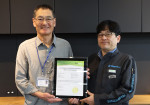 From left: Award recipients Kazuhiko Omote, General Manager, X-ray Research Laboratory; and Raita Hi