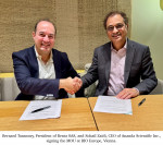 Bernard Tannoury, President of Benta SAS, and Sohail Zaidi, CEO of Ananda Scientific Inc., signing t