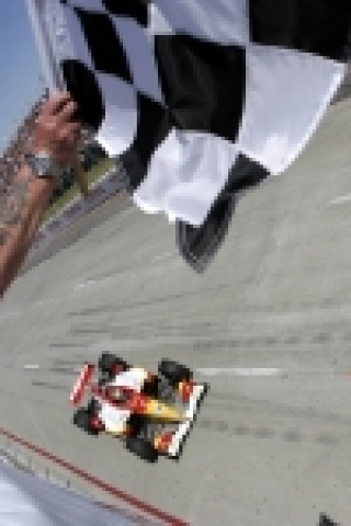 Sebastien Bourdais takes the checkered flag