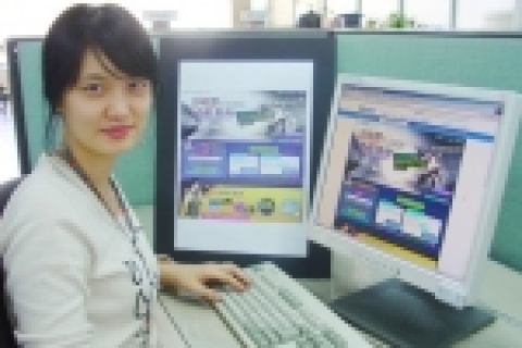 파워콤 직원이 공동마케팅을 벌이고 있는 G마켓 사이트에 접속하고 있다.