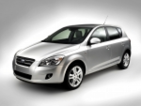 Kia Motors Corporation issued the first official photographs of its all-new family car -- code named