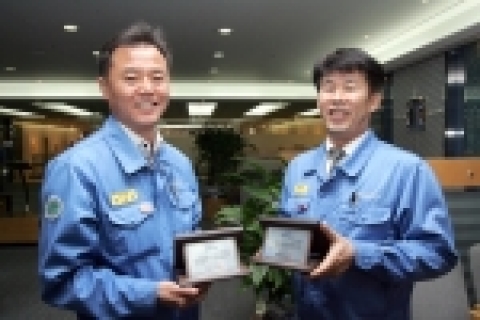 해도동 자매결연 활동의 전도사 박희원대리(좌측)와 이한규 대리