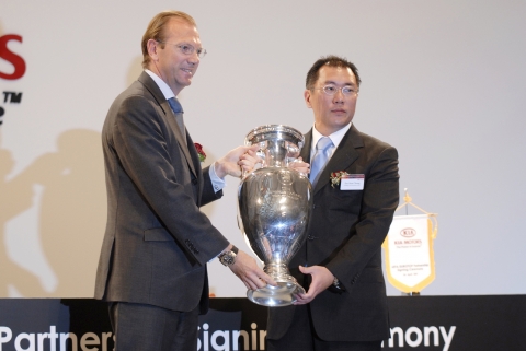 UEFA Signing Ceremony - Philippe Margraff with Kia CEO Euisun Chung - 24 April
