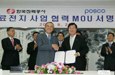 왼쪽 이구택 포스코 회장, 오른쪽 이원걸 한전 사장