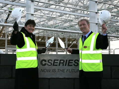 Michael Ryan, Vice President and General Manager, Bombardier Aerospace, Belfast, and Northern Ireland Enterprise Minister Arlene Foster are pictured laying a special corner stone to mark the construction of Bombardier&#039;s new CSeries aircraft wing manufacturing and assembly facility.