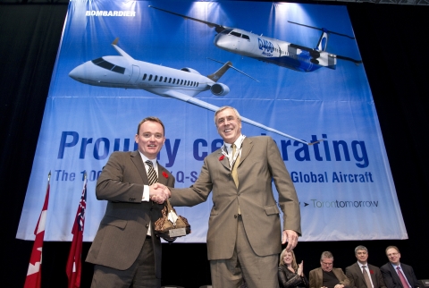 Ian McDougall, Chairman of the Canadian Air & Space Museum presents Simon Roberts, Vice President and General Manager, Turboprops and Toronto Operations with a Canadian Air & Space Pioneer award in recognition of Bombardier Aerospace&#039;s Toronto site&#039;s Dash 8/Q-Series aircraft program.