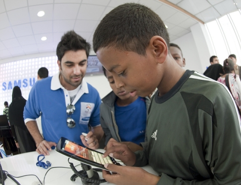 At Samsung Galaxy Fan Café, visitors are trying AFC Asian Cup Quiz through Galaxy Tab.