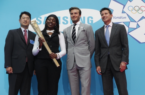 (L-R) Gyehyun Kwon Vice President & Head of Worldwide Sports Marketing at Samsung, Samsung & David Beckham&#039;s first Torchbearer nominee Gabriella Roseje, David Beckham Samsung&#039;s Global Ambassador for London 2012 Olympic Games, Lord Sebastian Coe Chairman of LOCOG attend the launch of Samsung&#039;s Olympic Games campaign "Everyones Olympic Games" in Canary Wharf, London.  PRESS ASSOCIATION Photo. Picture date: Monday June 13, 2011.   Photo credit should read: David Parry/PA Wire