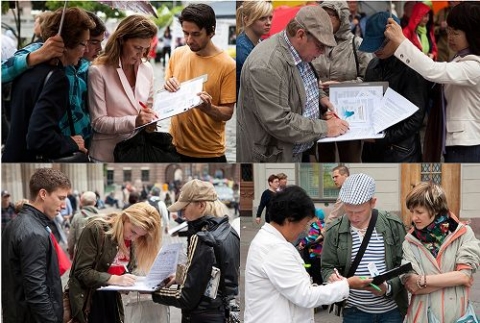 유럽 시민들이 장기적출 반대 서명 중이다.
