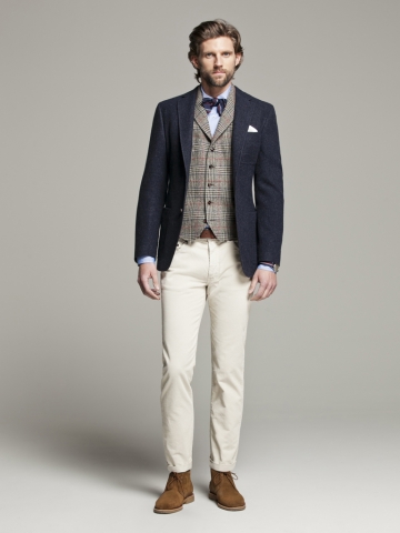 CH 캐롤리나 헤레라의 남성복 라인이 올 겨울 스타일링 아이템으로 글렌체크 베스트를 제안한다.