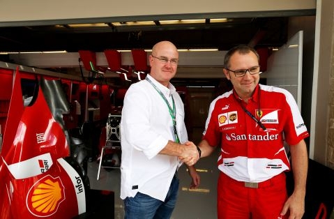 At the Circuit of The Americas track in Austin, Texas (the location of the 2013 Formula 1 U.S. Grand Prix), Oakley CEO Colin Baden and Scuderia Ferrari Team Principal Stefano Domenicali celebrate the signing of a new partnership agreement between their two companies. Oakley and Ferrari will share design philosophies, technical advances, inspiration and innovation over a multi-year period.