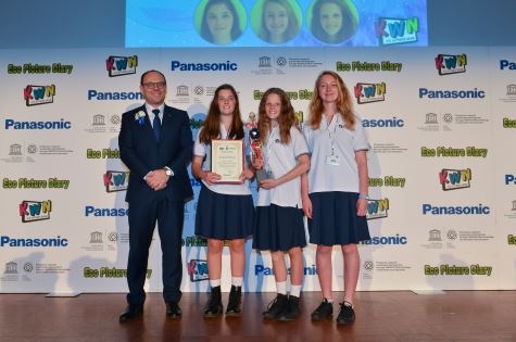 Kid Witness News Grand Prix winning team receiving the trophy from Panasonic France Managing Director, Eric Novel