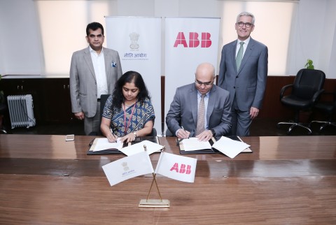 Anna Roy of NITI Aayog and Sanjeev Sharma, managing director of ABB India, sign a statement of partnership in advanced manufacturing technologies, including digital and AI, in New Delhi today. Looking on are Amitabh Kant, CEO of Niti Aayog, and Ulrich Spiesshofer, CEO of ABB