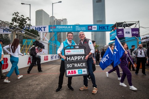 ABB CEO Ulrich Spiesshofer congratulates Alejandro Agag, chairman/ founder of the ABB FIA Formula E Championship, on the grid for the series’ 50th race, by presenting a specially commissioned pitboard to mark the occasion.