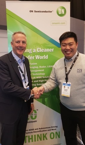 Wade Appleman, Vice President of ON Semiconductor and JiSeong Jeong, CEO of SOS LAB are taking a pho...