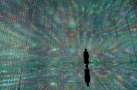 Using the teamLab app, visitors can participate in the work to create light sculptures that expand i
