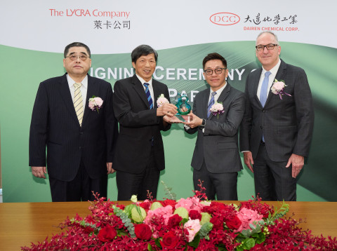 The LYCRA Company presents the Green Partner Award to DCC. (l. to r.) Shean-Tung Lin of DCC; Fu-Chu 