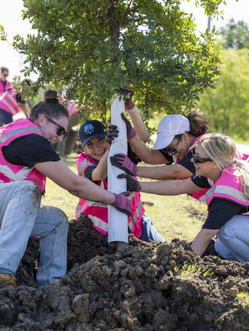 The tree planting event symbolized Mary Kay’s 60th anniversary of enriching the lives of women and t