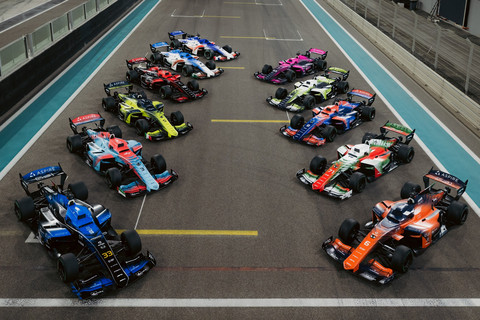EAV-25 autonomous racecars from finalist teams line up on the grid at Yas Marina Circuit. (Photo: AE