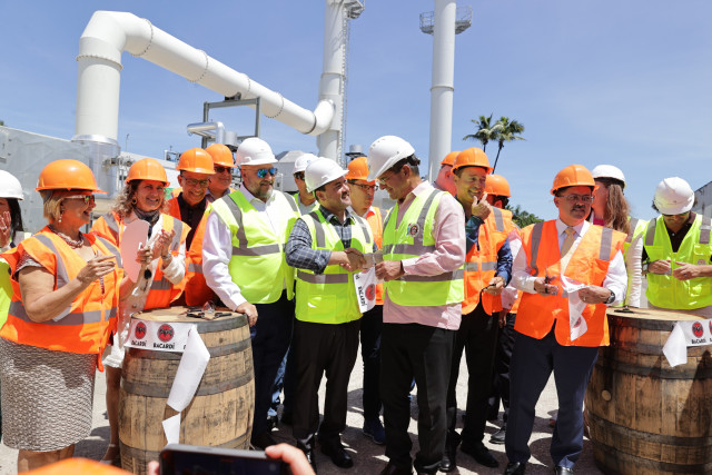 Edwin Zayas, VP of Operations Bacardi Corporation (center left), with Puerto Rico Governor Pedro Pie...
