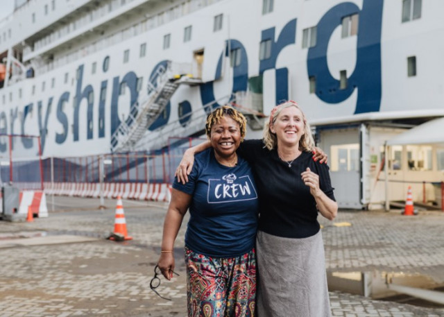 Catherine Conteh reunited with the nurse, Aly Hogarth-Hall, who helped save her life 30 years ago. The pair have been reunited and are volunteering together on board Mercy Ships‘ newest hospital ship the Global Mercy, in Catherine’s home country of Sierra Leone. (Photo: Business Wire)
