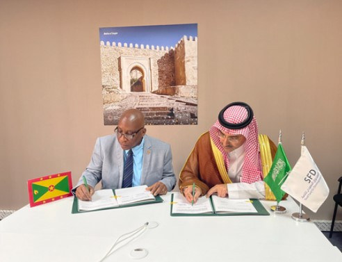 SFD CEO, H.E. Sultan Al-Marshad, and Minister of Finance of Grenada, Hon. Dennis Cornwall, signed th...