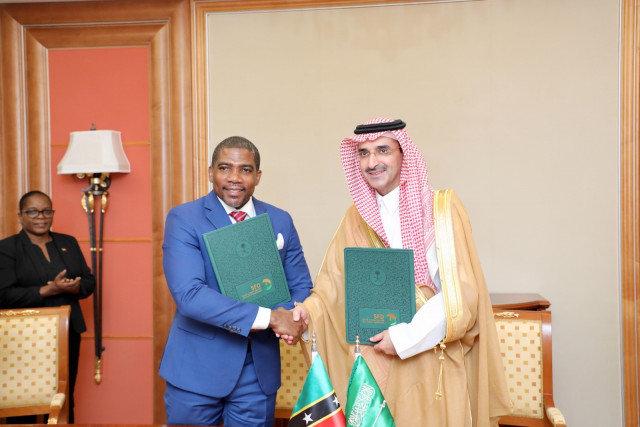 SFD’s CEO, H.E. Sultan Al-Marshad (right), poses for a photo with the Prime Minister of Saint Kitts ...