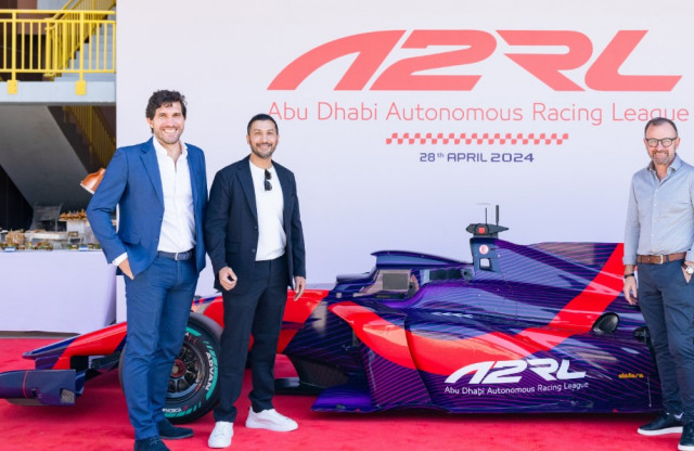 ASPIRE’s team with the newly debuted autonomous Super Formula SF23 racing car in Abu Dhabi (Photo: A...
