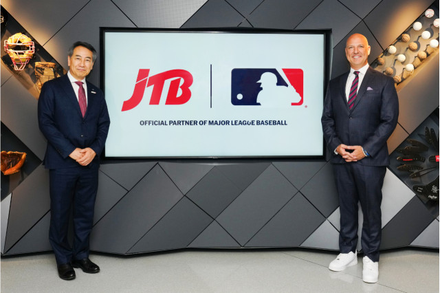Eijiro Yamakita, JTB President & CEO (left) at MLB headquarters in New York City with Noah Garden, D...