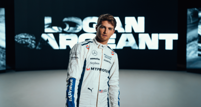 Logan Sargeant, F1 driver for Williams Racing, wears the team‘s 2024 overalls featuring Komatsu’s lo...