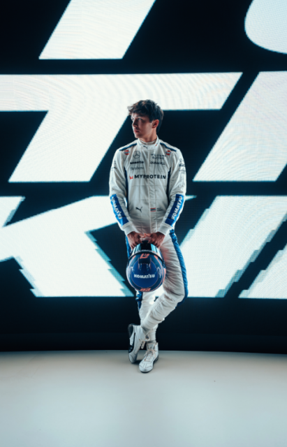 Alex Albon, F1 driver for Williams Racing, wears the team‘s 2024 overalls and helmet featuring Komatsu’s logo. (Photo: Business Wire)